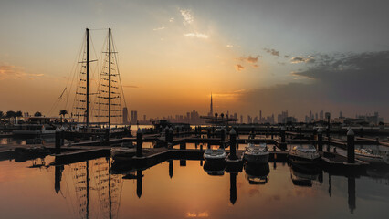 Sunset in the Marina boats of Dubai. High-quality photo. 