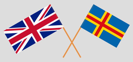 Crossed flags of United Kingdom and Region of Aland. Official colors. Correct proportion