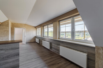 Indoor view of an empty attic of a new modern house