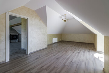 Indoor view of an empty attic of a new modern house
