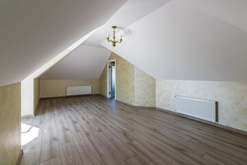 Indoor view of an empty attic of a new modern house