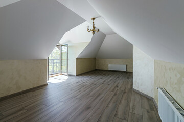 Indoor view of an empty attic of a new modern house