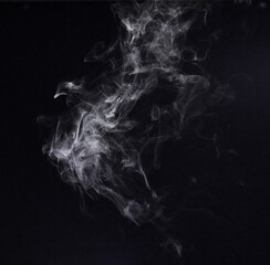 Steam, fog or gas in a studio with dark background by mockup space for magic effect with abstract. Incense, smoke or vapor mist moving in air for cloud smog pattern by black backdrop with mock up.