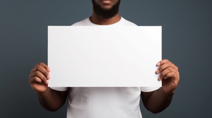 A man holding a white piece of paper. A message, a message, a new idea, an idea, diversity. Blank space for text or logo. Image generated by AI.