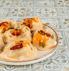 Delicious autumn dumplings with pumpkin and dried tomatoes