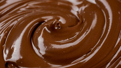 Melted dark chocolate, close up. Confectionery concept