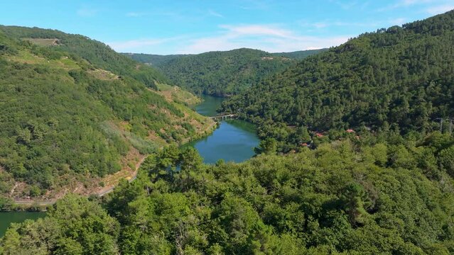 Forested Mountains Revealed Belesar Village In Ribeira Sacra Vineyards, Galicia, Spain. Aerial Drone Shot