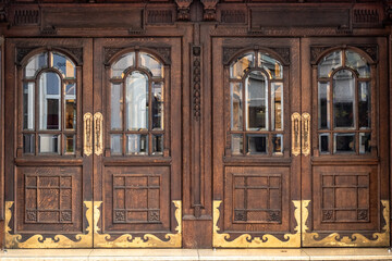 Wooden theatre doors with brass trimming in London's West End