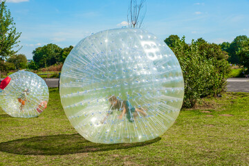 children have fun in the Zorbing Ball