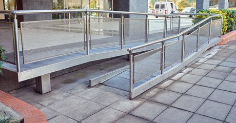 disabled wheelchair access ramp entrance to a building background