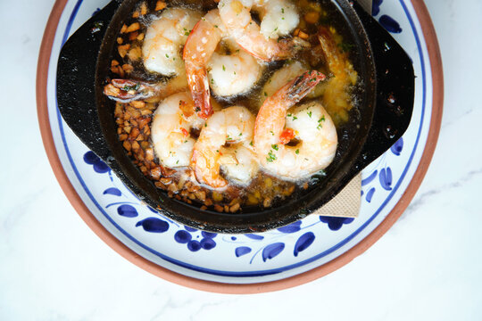 Bowl of shrimps sauteed in butter and garlic