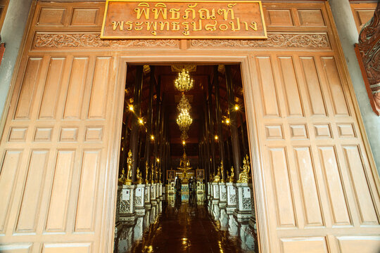 Museam of Wat Krathum Suea Pla(temple) ,Bangkok, Thailand. the principal body of a Buddha statue 80. And surrounded by 80 smaller Lord Buddha in various postures.