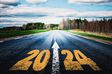 New year 2024 written on highway.future,work start run line vision concept.Nature landscape road...