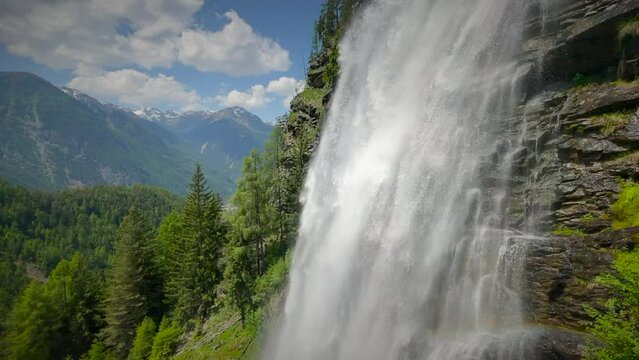 Stuibenfall waterfall bigest waterfall in Tirol in the Ötztal valley in Tyrol Austria during a beautiful springtime day in the Alps. Slow motion clip.