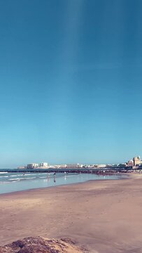 Vertical video. Romanticize your social media content with these captivating views of Cadiz, Spain, and its surrounding ocean waters.