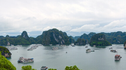Aerial view floating fishing village and rock island, Halong Bay, Vietnam, Southeast Asia.