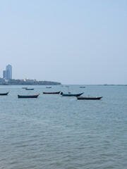 Group of the small fishing boat in the bay.