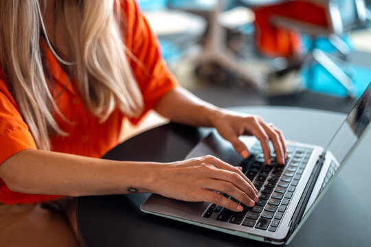 person typing on laptop