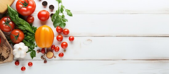 Healthy cooking with fresh products on white wooden table text space