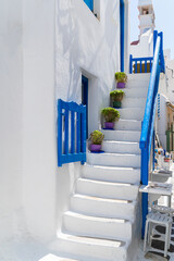 Typical street scen in Mykonos Town one of the Cyclades islands in Greece - 653842953