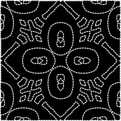 
A repeat pattern of white dots on a black background. White mandala.
