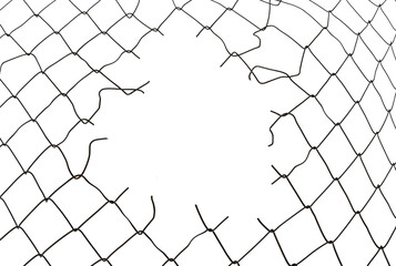 The texture of the metal mesh. Torn, destroyed, broken metal mesh on a white background