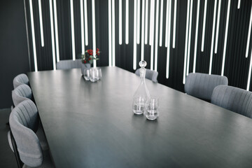 Modern conference room with furniture. Table in empty corporate boardroom before business meeting. interior architecture