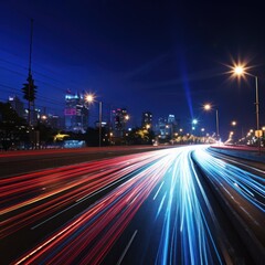 Colorful light trails from passing cars at night
