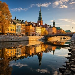 Fototapeta premium Serene waterfront cityscape with reflections in water