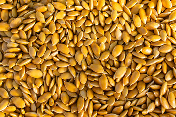 Pumpkin seeds. Yellow pumpkin seeds, background