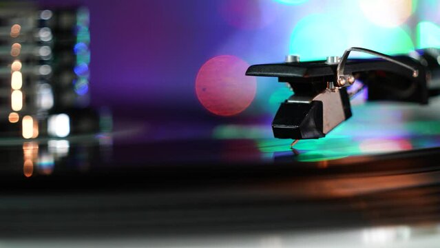 Needle of Vinyl long Play turntable on during reading music high resolution sound quality retro Smoot turn and touch for background.