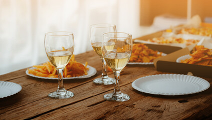 Group of young asian office girl friends having fun and celebrating pizza on table during party