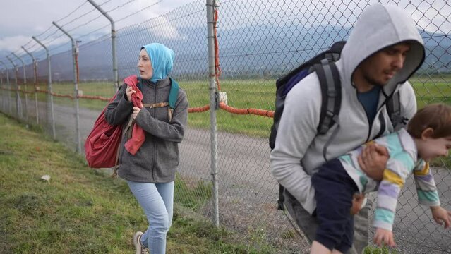 a refugee family runs Illegal Border crosser