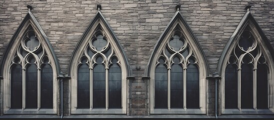 Church exterior features Gothic pointed arches