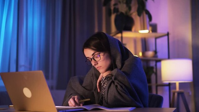 Boring tired young student freelancer with glasses falling asleep during study or work at home workplace Stressed female exhausted from remote distance work or education and hard program at late night
