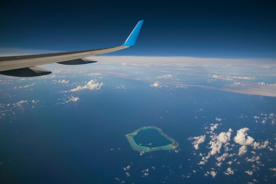 Atoll from a private jet near Tahiti; Tahiti