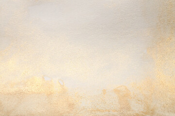 Watercolor paper grain texture painting wall. Abstract gold, nacre and beige marble copy space...