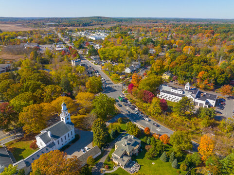 Wayland historic town center aerial view in fall with fall foliage at Boston Post Road and MA Route 27, including First Parish Church and Town Hall, Wayland, Massachusetts MA, USA. 