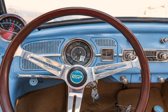 1966 Volkswagen Beetle. Car interior. Dashboard, speedometer, steering wheel, radio.