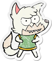 Obraz premium distressed sticker of a cartoon grinning fox