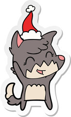 happy hand drawn sticker cartoon of a fox wearing santa hat
