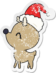 hand drawn christmas distressed sticker cartoon of kawaii deer