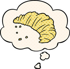 cartoon croissant with thought bubble in comic book style