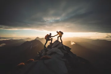 Fotobehang Two climbers manage to ascend to the summit of a mountain sunset,after hard teamwork,reaping the rewards of collaboration to achieve common goals and accomplishments, attaining success through effort  © SnapVault