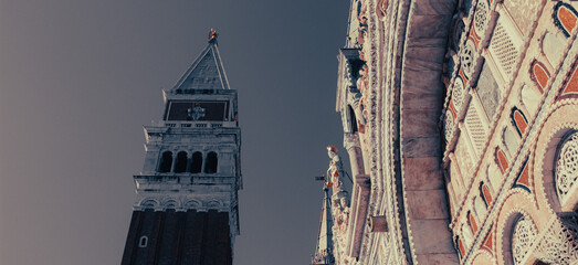 Cinematic scenographic image. Detail of San Marco basilica and bell tower, Venice.