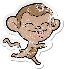 distressed sticker of a funny cartoon monkey running