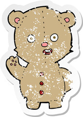 Fototapeta premium retro distressed sticker of a cartoon teddy bear