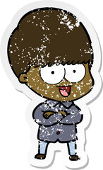 distressed sticker of a happy cartoon boy