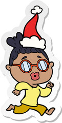 hand drawn sticker cartoon of a woman wearing spectacles wearing santa hat