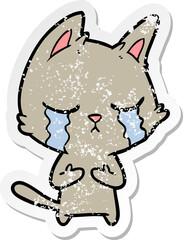 distressed sticker of a crying cartoon cat